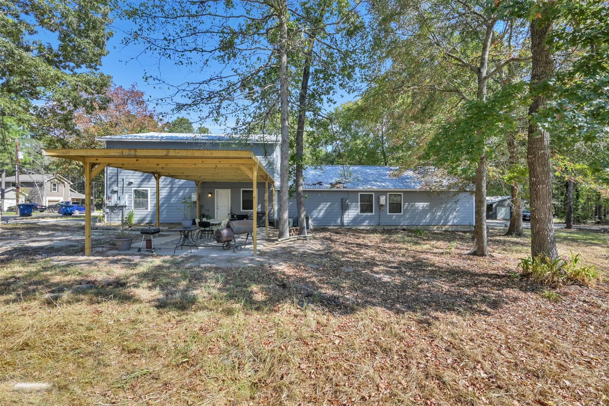 Welcome to 15876 Pecan Drive! This property wooded and unique.  Unit A's front entrance is on the left, and unit B is on the right with its own entrance. 2